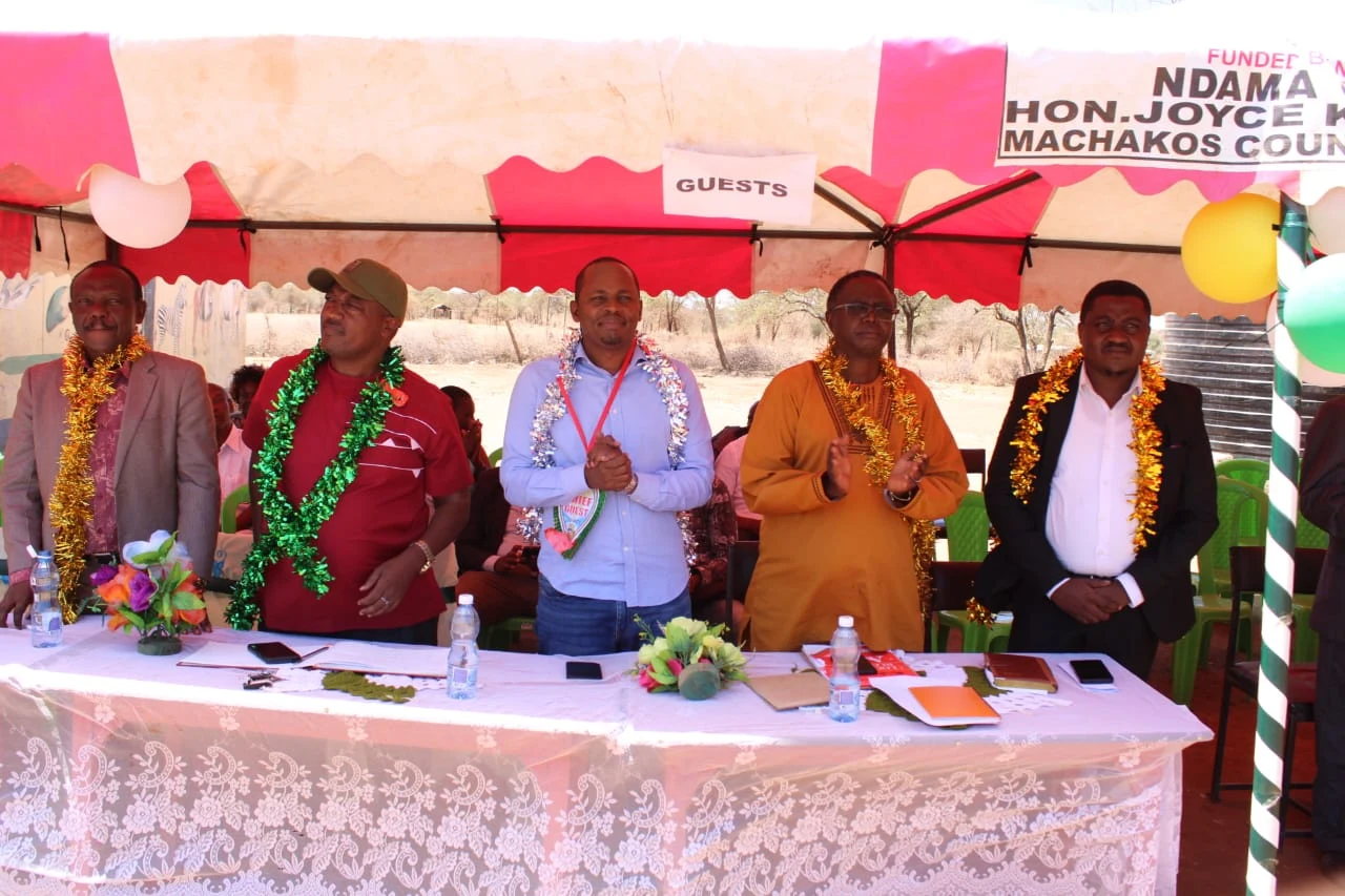 Adults gathered at a decorated school event